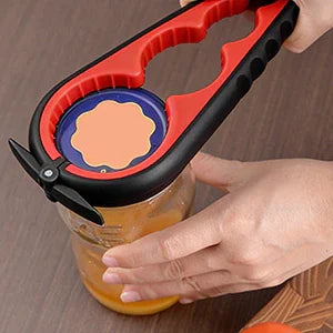 Hand using jar opener tool with ergonomic grip on sealed jar lid, ideal for limited mobility