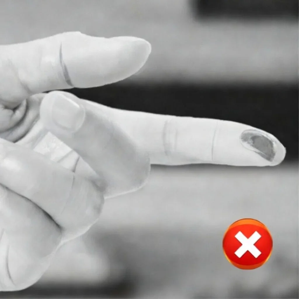 Hand with stiff joints extending index finger incorrectly, red X warning symbol shown