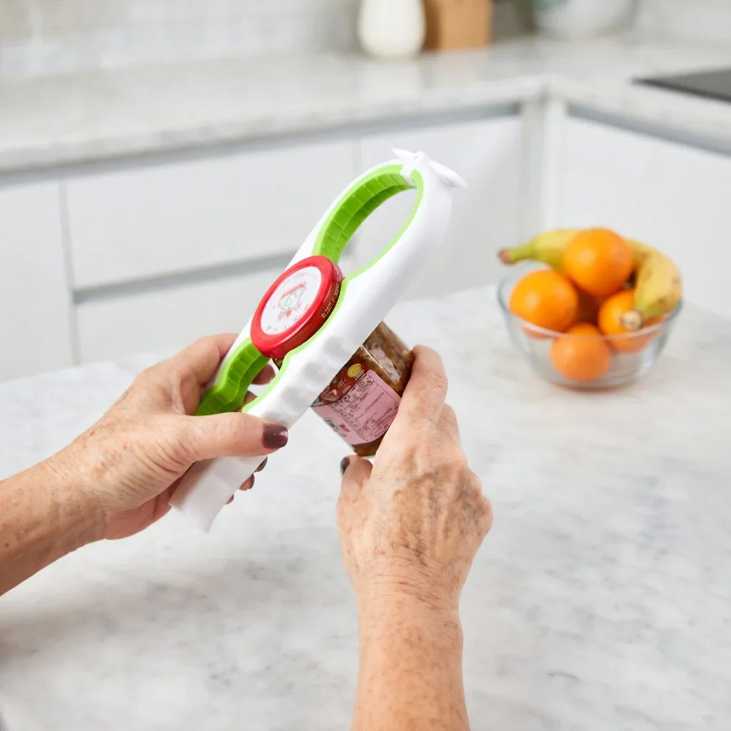 Person using a jar opener tool on a jar in a modern kitchen, adaptive aid for arthritis