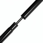Close-up of a black extendable reacher grabber tool shaft on white background
