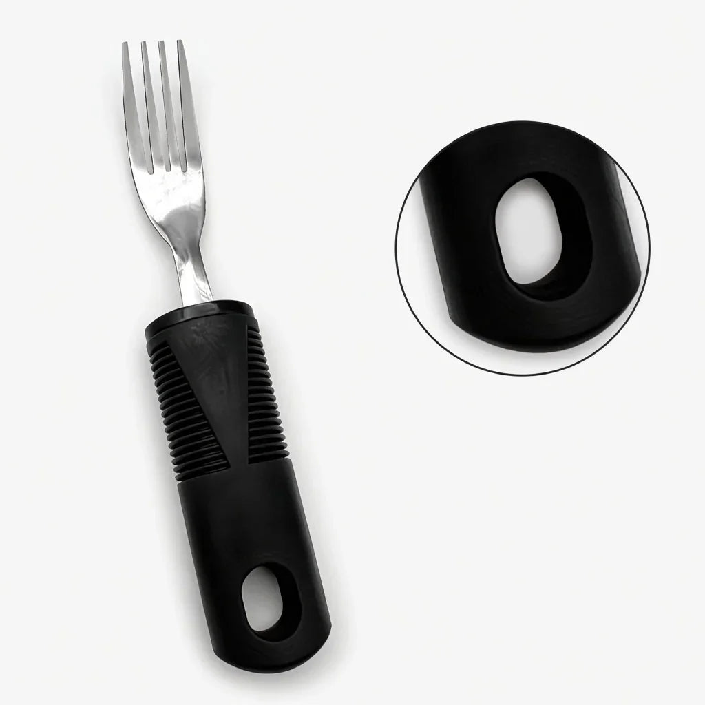 Adaptive fork with thick, ribbed black handle for easy grip, close-up of handle hole